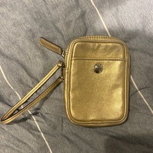 Small gold coach wristlet